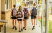 Feature - Girl Junior High School Students Arriving at School_0